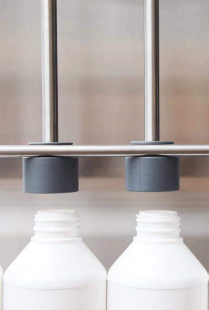Drip-free rotary cream and lotion filler designed for daily chemical and personal care lines