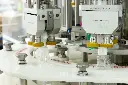 Capping machine for long dip tube pumps.webp